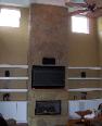 Fireplace surrounds made of solid cast concrete or stamped concrete overlays 